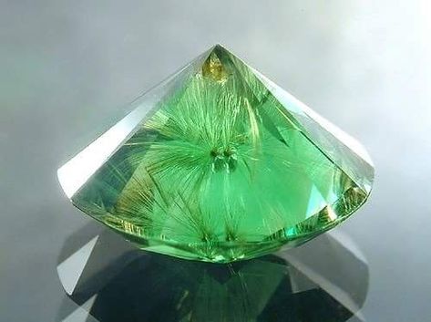 Demantoid Garnet from Russia showing fine "Horse-tail" like fibres of "Byssolite" emanating from a tiny black chromite core. Amazing Geologist Magic Faraway Tree, The Magic Faraway Tree, Faraway Tree, Black Pinterest, Horse Tail, Demantoid Garnet, Pretty Rocks, Summer Street, Beautiful Rocks