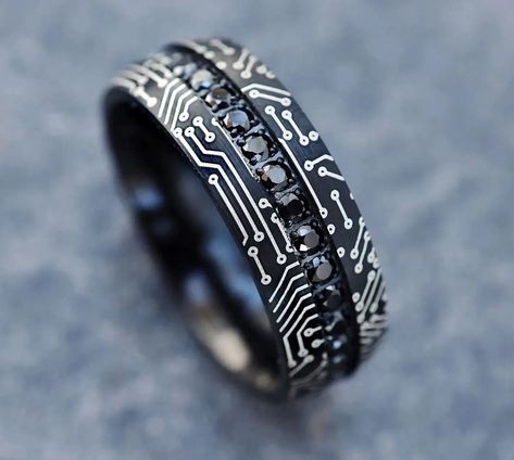 We've crafted the ultimate list of the best wedding bands we can find. From classic yellow gold to wood and tungsten styles, we've covered all the bases. Take a peek at our favorite wedding rings and styles for men! Geek Wedding Rings, Cool Mens Wedding Bands, Mens Wedding Rings Black, Chip Design, Mens Wedding Rings Tungsten, Computer Circuit, Cool Rings For Men, Cool Rings, Victorian Pattern