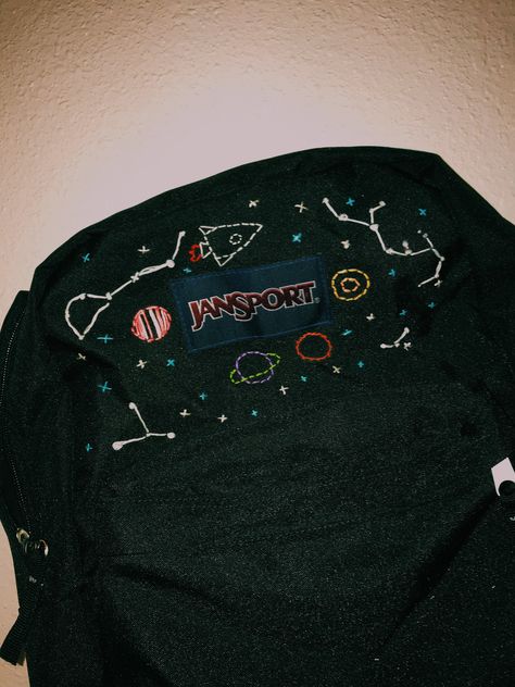 space embroidered backpack Embroidery Designs On Backpacks, Embroidery Designs Backpack, Backpack With Pins Aesthetic, Backpack Embroidery Ideas Jansport, Embroidering Backpacks, Embroidered Backpack Jansport, Diy Backpack Decoration Ideas, Backpack Customize Ideas, Drawing On Backpack