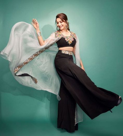 Introducing latest Bridal & Bridesmaids oufits ideas ft. Madhuri Dixit. From designer lehenga design to stylish designer sarees, ,we have got amazing designs for all. #shaadisaga #indianwedding #madhuridixitdancedeewaneoutfits #madhuridixitoutfitsdesignersarees #madhuridixitlehengaindianweddings #madhuridixitsuits #madhuridixitdancedeewaneoutfitslatest #madhuridixitdressesfashionstyle #madhuridixitlehenga #madhuridixitsarees #madhuridixitblacksaree #madhuridixitbluelehenga #madhuridixitredsaree Indo Western Dresses, Trendy Outfits Indian, Outfits Indian, Style Guru, Indo Western Dress, Western Dress, Madhuri Dixit, Indian Wedding Outfits, Indian Designer Outfits