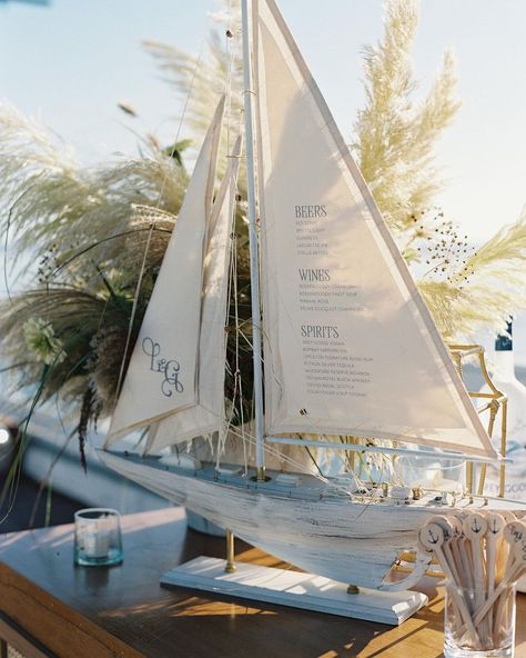 Yonder Design on Instagram: “SAILBOAT SIGN // We loved collaborating with Jesse Tombs to create this sailboat cocktail sign for a Laura and Galen’s welcome party with…” Coastal Wedding Theme, Sailboat Wedding, Santa Lucia Preserve, Nantucket Wedding, Beachy Wedding, Boat Wedding, Sea Wedding, Cocktails Sign, East Coast Wedding