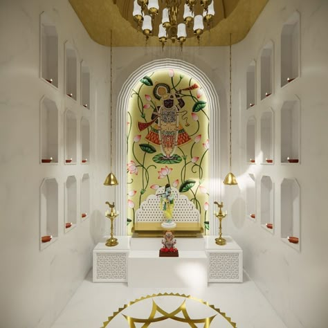 A minimalistic temple corner with elegant marble touches ✨ This mandir exudes tranquility, accentuated by a touch of grandeur and artistry. The arch frames a custom hand-painted Pichwai, with marble-carved niches on both sides adding depth and light. The brass inlay flooring provides a soothing and central element for prayer, while the gold leafed ceiling enhances the serene ambiance. #temple #templedesign #interiors #livingroom #beddroom #wooden #minimalisticdesign #interiordesign #design... Mandir Niche Design, Pichwai Mandir, Ashwini Dongre Interior Design, Temple Ceiling Design, Brass Inlay Flooring, Mandir Ceiling Design, Marble Mandir Design, Marble Pooja Mandir, Mandir Design Puja Room