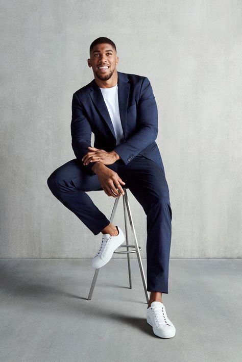 the famous British boxing world champion Anthony Joshua in casual outfit with Hugo Boss trendy suit Corporate Shoot, Strong Woman Tattoos, Suits And Sneakers, Beautiful Women Quotes, Handsome Men Quotes, Men Poses, Handsome Style, Mens Photoshoot, Anthony Joshua