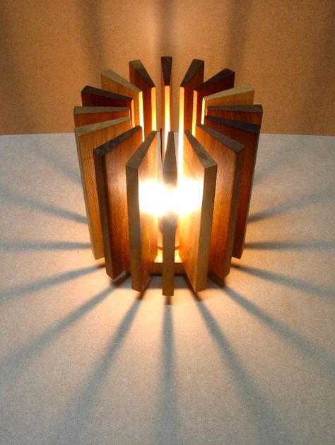 A lamp made from recycled wooden pieces recovered from a carpenter’s workshop. Recycled Lamp, Wooden Lamps Design, Diy Luminaire, Wood Lamp Design, Luminaire Original, Diy Lampe, Creative Lamps, Wooden Light, Wooden Lamp