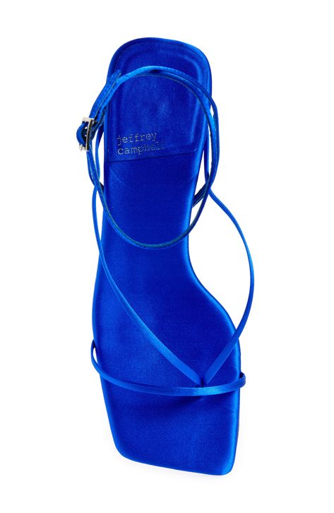 This strappy sandal grounded by a flared heel is a suave and modern addition to any look. 2 3/4" heel (size 8.5) Adjustable ankle strap with buckle closure Leather upper/leather and synthetic lining/synthetic sole Imported Blue Elegant Heels, Hoco Shoes, Slippers Heels, Teal Heels, Formal Heels, Blue High Heels, Heels Sneakers, Modern Addition, Wedding Guest Shoes