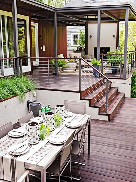 The two-tiered design welcomes backyard views and casual gatherings: http://www.bhg.com/home-improvement/deck/ideas/deck-photos/?socsrc=bhgpin060114alfrescodining&page=10 Decking Designs, Design Per Patio, Terrasse Design, Balkon Decor, Deck Makeover, Modern Deck, Patio Deck Designs, Deck Designs Backyard, Summer Backyard