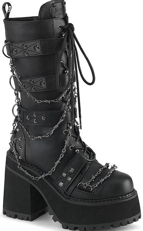 The ultimate biker boots! Covered in barbed wire chain decals and flanked with studs, these boots are a step up on yer regular punk kicks! Black PU Vegan 4 3/4 inch heel 2 1/4 inch platform Metal Cone Studded Hook-N-Loop Straps W/ Bull Ring Centers and Clip-On Hanging Barbed Wire Chain, D-Ring Details & Barbed Wire Chain Across the Toe, Inside Metal Zip Closure Mid Calf High Boots U.S women's sizing-refer to size chart for more info - these run smaller than the Shaker series if in doubt size up. Goth Camping Outfit, Goth Boots Men, Goth Boots Aesthetic, Spiky Boots, Alt Boots, Mid Calf High Boots, Boots With Chains, Gothic Platform Boots, Emo Boots