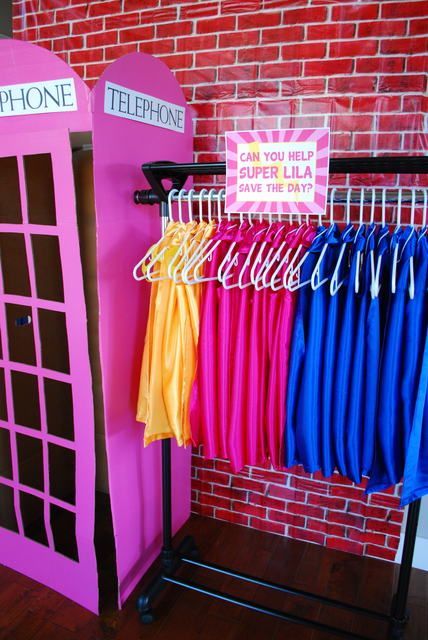 Capes and phone booth at a Girl Superhero Party #girlsuperhero #party Batgirl Party, Pink Superhero, Superhero Birthday Party Ideas, Supergirl Party, Superhero Girls Birthday, Girl Superhero Party, Wonder Woman Party, Woman Birthday, Batman Birthday