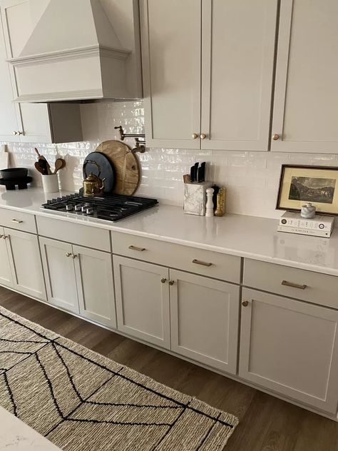 50 Small Kitchen Storage Ideas You'll Wish You Knew Sooner Kitchen Cabinets Beige, Taupe Kitchen Cabinets, Beige Kitchen Cabinets, Greige Kitchen, Taupe Kitchen, Off White Cabinets, Beige Cabinets, Galley Style Kitchen, Black Countertops