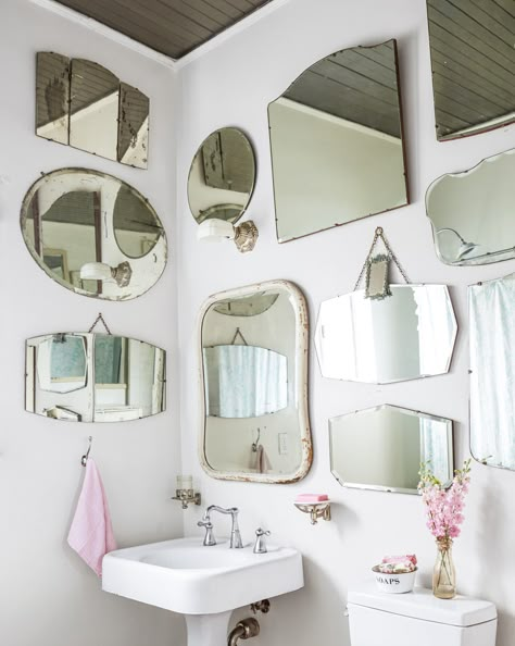 The five members of the Pata family successfully share a single bathroom—a Jack and Jill that sits between the children's rooms. A collection of vintage mirrors makes the bathroom appear larger. Vintage Bathroom Mirrors, Decorative Bathroom Mirrors, Mirror Gallery Wall, Mirror Gallery, Vintage Mirror Wall, Vintage Mirrors, Vintage Bathrooms, Simple Bathroom, Mirrors Wall