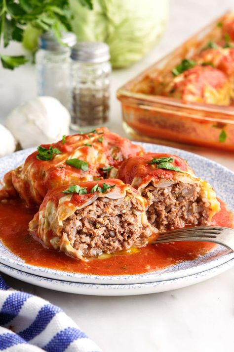 Ground beef, Italian sausage, long grain rice, and plenty of flavorful seasonings are stuffed inside tender cabbage leaves then doused in tomato sauce in this cabbage roll recipe. Best Cabbage Rolls, Cabbage Meals, Best Cabbage Rolls Recipe, Slow Cooker Cabbage Rolls, Easy Cabbage Rolls, Chicken Crockpot Recipes Healthy, Stuffed Cabbage Rolls, Crockpot Recipes Healthy, Cabbage Roll