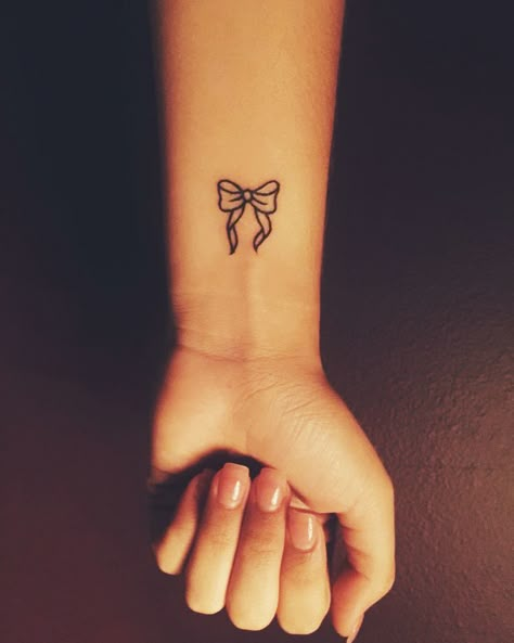 60 Sexy Bow Tattoos – Meanings, Ideas and Designs for 2021 Boog Tattoo, Tattoos About Mom, Tattoos About Growth, Magic Tattoo Ideas, Tattoos Dainty, Tattoos Behind Ear, Tattoos With Deep Meaning, Tattoos Cross, Small Wave Tattoo