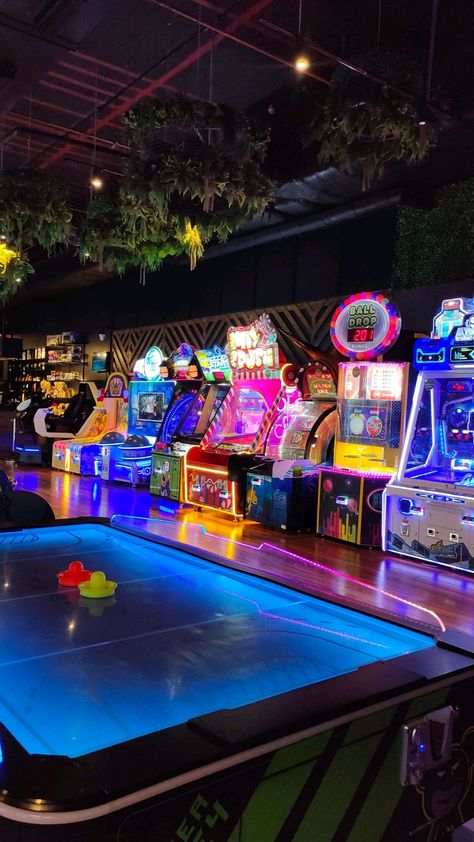 #gameroom #gamingcave #gamedesign #gamerlife #gamingsetup #homedecor #interiordesign #gamingideas #gamerroom #manCave Luxury Arcade Room, Game Arcade Design, Arcade Aesthetic Korean, Game Bar Design, 80s Aesthetic Party, Vintage Arcade Aesthetic, Neon Arcade Aesthetic, Garage Arcade, Arcade Games Aesthetic