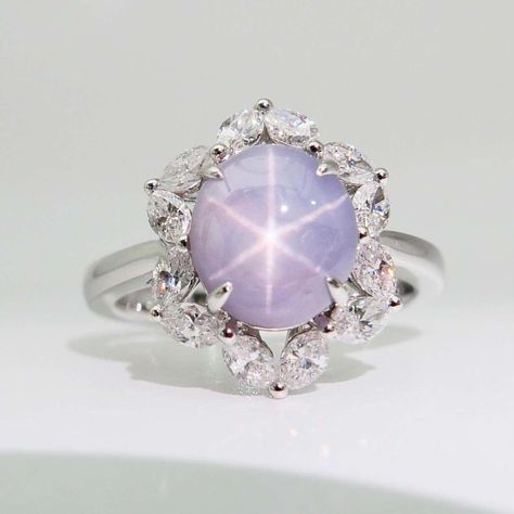 For Sale on 1stDibs - Here is a superb natural star Sapphire and diamond ring. The ring is set in 18k white gold and diamonds. There are Marquis diamonds that make up this setting. Princess Gown Design, Star Sapphire Ring, Diamond Cocktail Ring, Princess Gown, Sapphire And Diamond Ring, Star Sapphire, Diamond Cocktail Rings, Cabochon Ring, Marquise Diamond