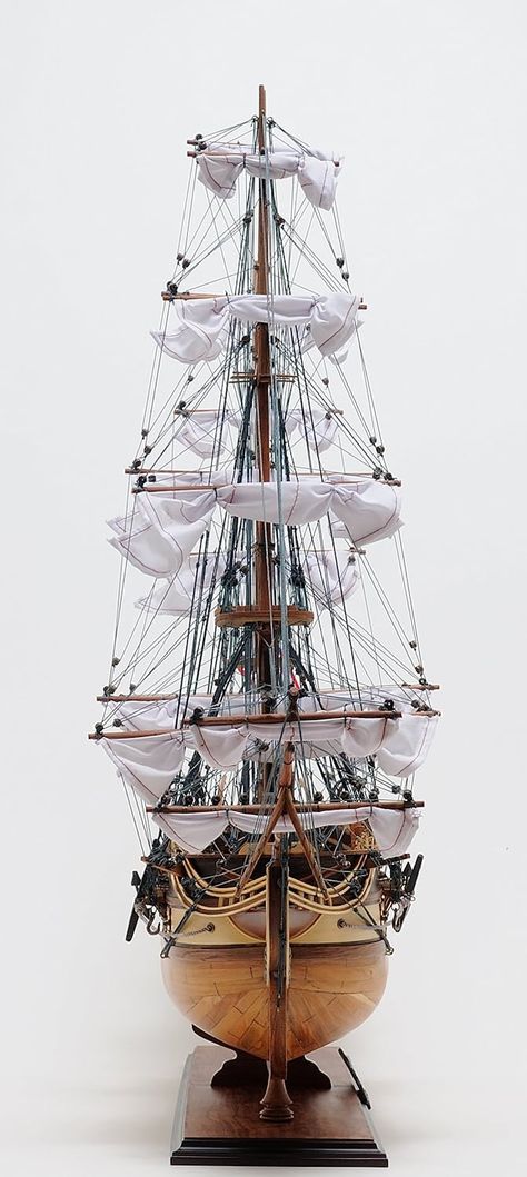 The U.S.S. Constitution, a three-mast frigate, is the world's oldest commissioned warship. This is an "exclusive edition" where the model has a unique serial number etched into the hull, which allows us to identify production date, material used and all other production information of a model. Master craftsmen using historical photographs, drawings or original plans meticulously handcraft these highly detailed wood models from scratch. They are built to scale with high-grade wood such as: wester Uss Constitution Model, Tall Ships Art, Ship Tattoo Sleeves, Table Top Display Case, Tall Ship Model, Uss Constitution, Wooden Ship Models, Model Sailboat, Old Sailing Ships