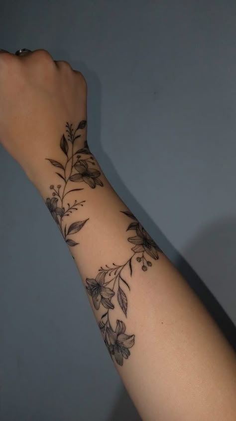 Flower Forearm Tattoo Wrap Around, Womens Wrap Tattoo, Women Outer Forearm Tattoo, Vines On Forearm Tattoo, Jasmine Flower Wrap Around Tattoo, Wrap Around Wrist Tattoos Flowers, Forearm Tattoo Women Grunge, Arm Wrap Around Tattoos For Women, Lotus Wrap Around Tattoo