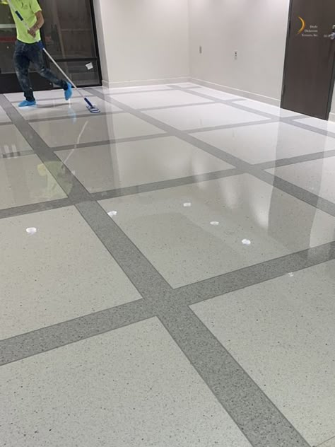 Installation of new terrazzo flooring for a Naval Office. Doyle Dickerson Terrazzo installer applying multiple coats of sealer, which protects the terrazzo floor from stains. #terrazzo #flooring #commercialflooring Chips Floor Design, Parking Tiles Design, Marble Tiles Floor, Terrazo Flooring, Tile Pattern Design, Stairs Tiles Design, Tiles Installation, Room Tiles Design, Chips Design