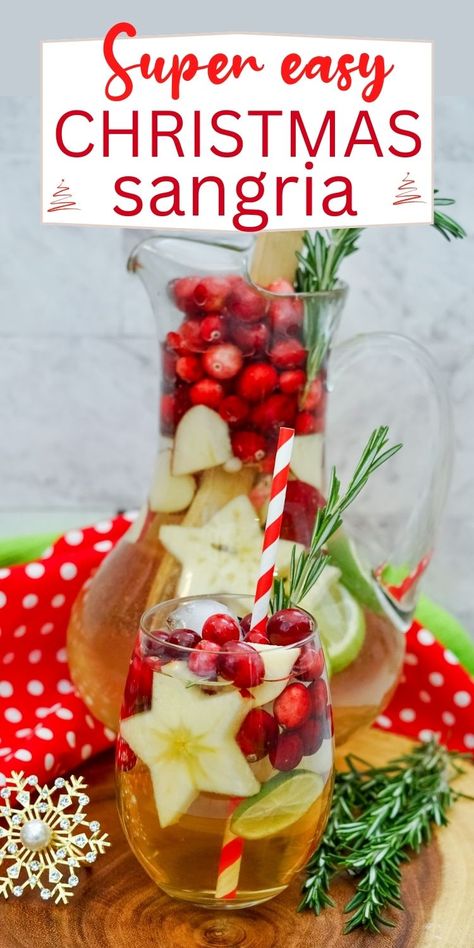 Winter White Sangria With Champagne Sangria With Champagne, White Christmas Sangria Recipe, White Christmas Sangria, Winter Sangria Recipes, Holiday Sangria Recipes, Champagne Sangria, Christmas Sangria Recipes, White Wine Sangria Recipe, White Sangria Recipe