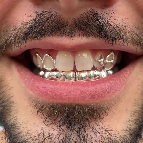 London and NYC book through my website! We’re international now :) Creative freedom custom shape, windows and 2x4 teeth on bottom in silver #grillz #grillznyc #londongrillz #silver #star Silver Bottom Grillz, Silver Grillz Men, Grillz Men, Bottom Grillz, Teeth Gems, Silver Teeth, Silver Grillz, Grillz Teeth, Tooth Gems