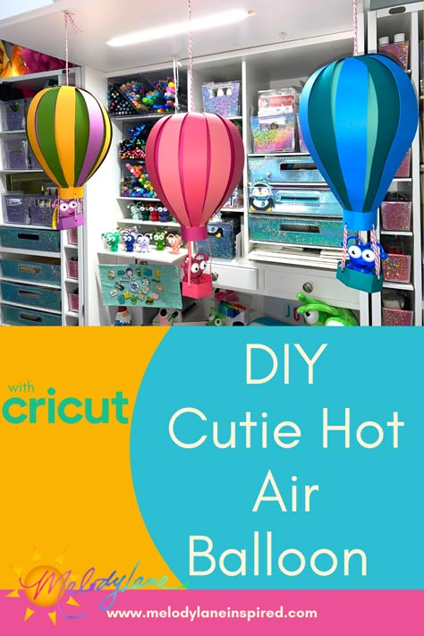 Create your own DIY Hot Air Balloon with your Cricut! Your Cricut Cutie can even ride in it! Cricut Hot Air Balloon, How To Make Paper Hot Air Balloons, Make A Hot Air Balloon, Craft Hot Air Balloon, Diy Paper Hot Air Balloon, Hot Air Balloon Paper Craft, Hot Air Balloon Svg, Hot Air Balloon Svg Free, Diy Air Balloon Decorations