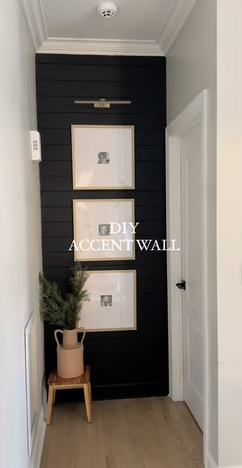 Entryway With Brick Wall, End Of Hall Decorating Ideas, End Of Hall Accent Wall, End Of Hallway Decor Ideas Small Spaces, Black And Brown House Interior Design, Accent Wall Front Entrance, Modern Sleek Interior Design, Small Hallway Wall Ideas, Front Entryway Wall Ideas