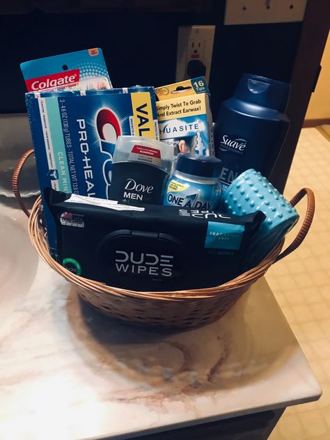 Gift Basket with Bathroom essentials #birthdaygift #giftbasketideas #birthdaybasket #bathroomessentials #toothbrush #toothpaste #dudewipes #backsrubber #dovedeoderant #dove #mensoneadays #birthdayhousetheme Bath Baskets Gift Ideas, Hygiene Basket, Bathroom Gift Basket, Baskets Gift Ideas, Bath Baskets, Dude Wipes, Creative Gift Baskets, Care Basket, Gift Ide