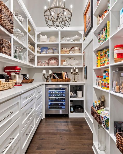 Designer Appliances | NJ & NY’s Appliance Experts | 🥫 Snacks, dinnerware, and a touch of class! Explore this white walk-in pantry where culinary essentials find a stylish home. Whether… | Instagram Walk In Pantry Appliance Storage, Walk In Pantry With Island, Pantry With Appliances, Walk In Pantry With Fridge, Walk In Pantry With Appliance Counter, Pantry With Appliance Counter, Walk In Pantry With Countertop, Dream Pantry Walk In Luxury, Dream Pantry Walk In