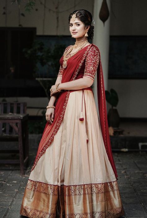 Wedding Dress Hindu Kerala, Grand Half Saree For Wedding, Half Saree Voni Designs, Traditional Dhavani Set, South Indian Style Half Saree, Traditional Dresses For Engagement, Red Pattu Half Saree, Marriage Outfits For Women Traditional, Kerala Traditional Half Saree Designs