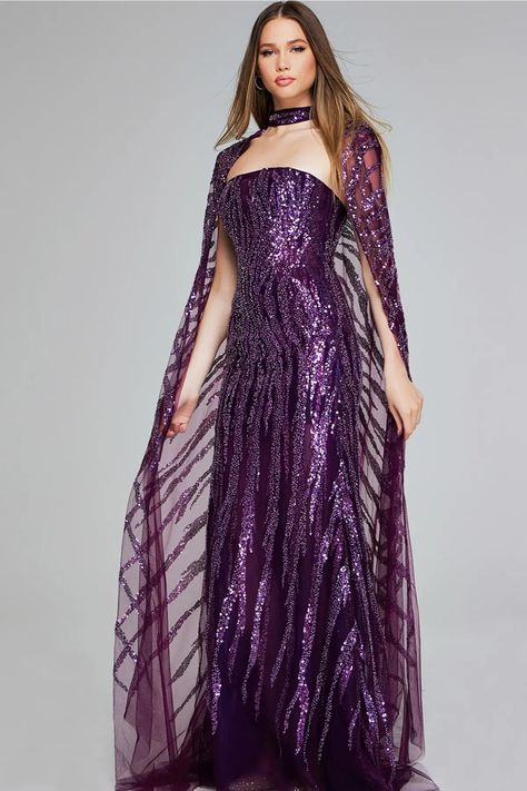 Jovani 39046 purple sequin gown featuring a dramatic cape and intricate detailing. Perfect for a truly unforgettable evening available in plus size. Cape With Collar, Navy Evening Dresses, Purple Cape, Sheer Cape, Glamorous Evening Dresses, Informal Wedding Dresses, Informal Dress, Silver Cocktail Dress, Wearing Purple