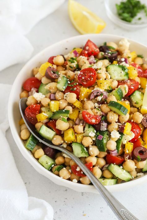 This easy Mediterranean Chickpea Salad combines colorful fresh veggies and a simple vinaigrette for a delicious, healthy side dish. We love using this Greek chickpea salad for meal prep lunches, paired with some grilled chicken or salmon for extra protein. This no lettuce salad doesn't get soggy and packs beautifully for work lunches, but also makes a delicious, fresh bbq side dish in the summer. Naturally gluten-free & vegan-friendly, it's great for a crowd! No Lettuce Salad, Meal Prep Lunches, Bbq Side Dish, Greek Chickpea Salad, Mediterranean Chickpea, Greek Chickpeas, Mediterranean Chickpea Salad, Bbq Side, Summer Salads With Fruit