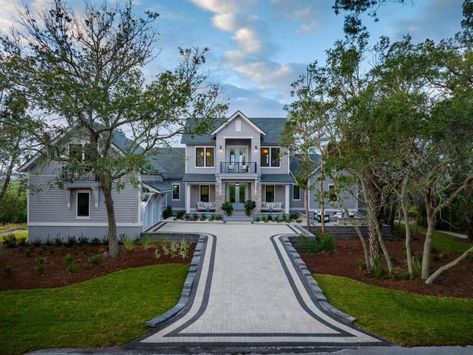 Thoughtful hardscaping choices from the custom designed driveway to the layered stonework on the home’s exterior add timeless style to this relaxed, coastal retreat. Gray Pavers, Hgtv Dream House, Front Driveway, Hgtv Dream Homes, Tour Pictures, Hgtv House, Tan Stone, Upstairs Loft, Hgtv Dream Home