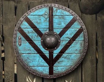 Shields Axes Paintings and Sculptures by HyperealismPaintings Shield Knight, Escudo Viking, Warrior Shield, Viking Medieval, Viking Battle, Wooden Shield, Viking Shield, Shield Maiden, Viking Symbols