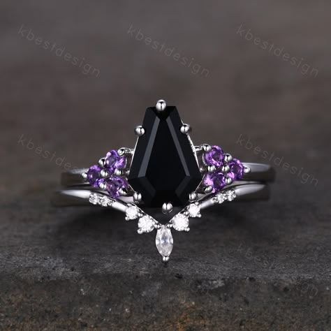 This is a beautiful black onyx and Amethsyt engagement ring set in sterling silver. Sterling Silver Black Onyx Engagement Ring Set Unique Coffin Shaped Ring Art Deco Moissanite Curved Wedding Band Amethyst Cluster Ring Unique coffin shaped ring, wedding ring, promise ring, anniversary gift. Engagement ring: Main Stone: 9x6mm coffin shaped black onyx. Side stone: 2mm amethyst Wedding band: Curved Moissanite This ring is marked S925/G10K/G14K I accept custom making order.Please contact me if you n Goth Engagement Rings Fairy, Black Coffin Engagement Ring, Black And Purple Engagement Ring, Coffin Wedding Rings, Coffin Shaped Ring, Onyx Gemstone Rings For Wedding, Elegant Black Amethyst Ring, Elegant Black Amethyst Jewelry, Black Gemstone Wedding Rings