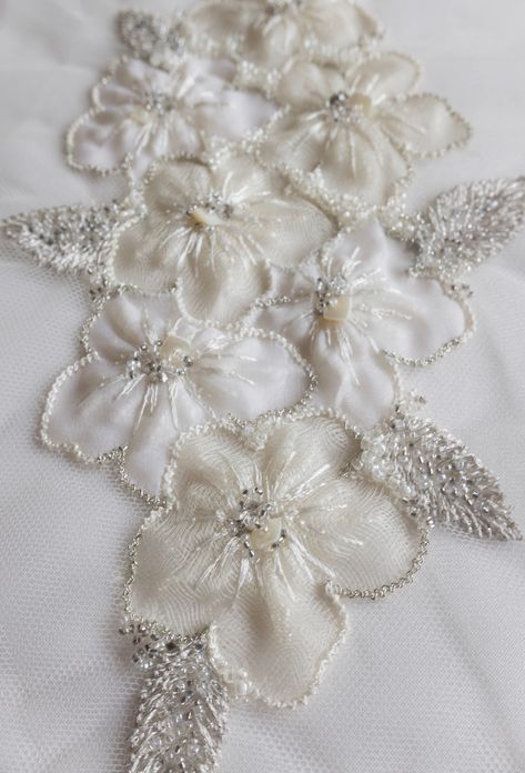 Hand-made motif with applique silk organza flowers #couture #beaded #handembroidery#wedding#sposa#novias#mariage#bridal#accessories#highfashion#atelier Tule Fabric, Tambour Beading, Motifs Perler, Organza Flowers, Beaded Leaf, Couture Embroidery, Bead Embroidery Patterns, Fabric Applique, Handwork Embroidery Design