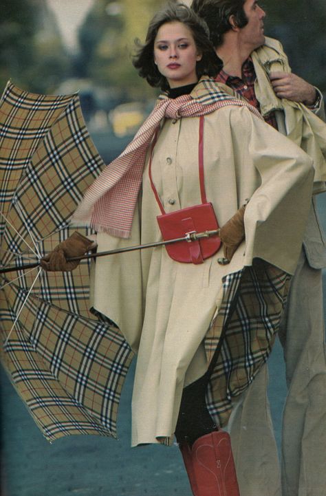 Lena Kansbod Poplin's Burberry lined poncho Cosmopolitan - March 1977 Photographed by Bruce Weber 1970's Makeup, 1970s Interior, Featherstone Vintage, Vintage Fashion 1970, Working Girl Style, 1970s Fashion Women, Vintage Outerwear, Fashion 50s, Fashion 1970s