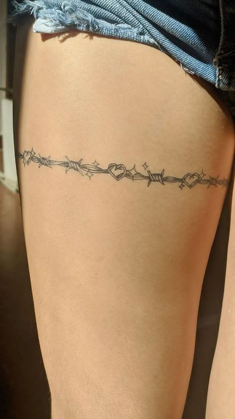 Knife With Barbed Wire Tattoo, Barbwire Around Arm Tattoo, Heart With Barb Wire Tattoo, Barb Wire Tattoo Around Thigh, Barb Wire Tattoo Around Leg, Barbed Wire Tattoo Around Leg, Barbed Wire Garter Tattoo, Barb Wire With Flowers Tattoo, Waist Chain Tattoo