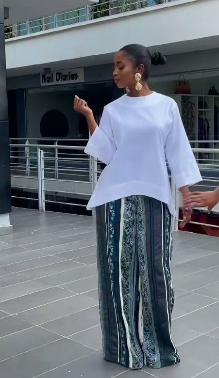 classy White top, wide leg pants, gold earrings Modest Trousers Outfit, White 2 Piece Outfit Pants, African Two Piece Outfit, 2piece Outfits Pants, Classy Modest Fashion, Two Pieces Trouser And Top, Casual Outfits Chic, Two Piece Outfits Pants, Boubou Styles For Women