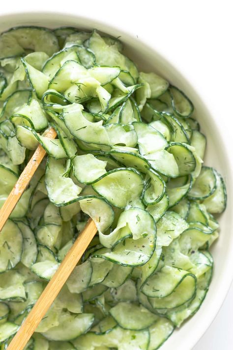 This refreshing Cucumber Yogurt Salad recipe features all the flavors of tzatziki in salad form. So if you love tzatziki, then you will love this creamy cucumber salad with all it's Greek and Mediterranean vibes. It’s loaded with crunchy cucumbers, creamy Greek yogurt, fresh dill, garlic and lemon. A quick and easy side dish that is SO GOOD! | www.mapleandmango.com Cucumber Yogurt Salad, Yogurt Salad, Cucumber Yogurt, Resep Diet, Healthy Food Dishes, Healthy Food Motivation, Cucumber Salad, Food Obsession, Side Dishes Easy