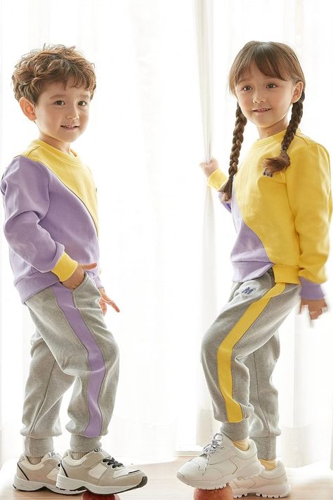 This clothing is made of a special fabric that quickly absorbs sweat and dries fast, making it perfect for top-notch quality children's sportswear. The fabric has a strong weave that takes care of children's skin while they wear it during physical activities. #kids #tracksuit Kids Tracksuits, Kids Sportswear, Fall And Winter Outfits, Jogger Set, Sport Wear, Physical Activities, Winter Outfit, Fall And Winter, Color Blocking