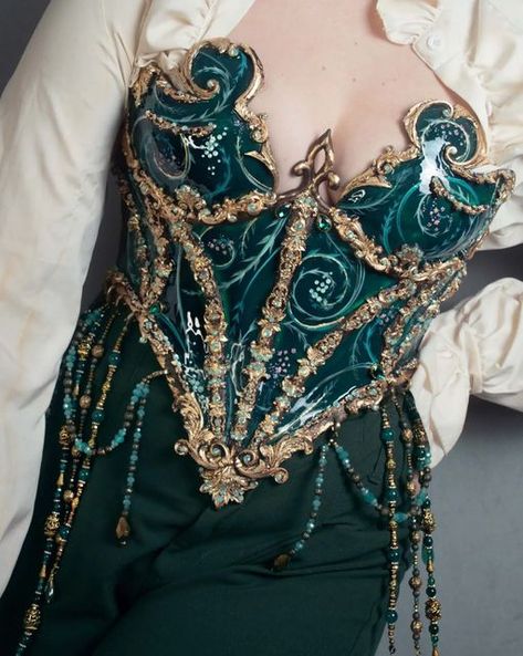 joyce Spakman on Instagram: "⠀⠀⠀⠀⠀⠀⠀⠀⠀ 𝓔𝓶𝓮𝓻𝓪𝓵𝓭 𝓫𝓪𝓻𝓸𝓺𝓾𝓮 𝓹𝓸𝓻𝓬𝓮𝓵𝓪𝓲𝓷 𝓬𝓸𝓻𝓼𝓮𝓽 ⠀⠀⠀⠀⠀⠀⠀⠀⠀ New corset design, one of a kind piece, launching today (march 16) at 20:00 CET. It will be for auction with 1 week bidding time. End date march 23. ⠀⠀⠀⠀⠀⠀⠀⠀⠀ Finished with high quality glass/ brass and crystal beading. ⠀⠀⠀⠀⠀⠀⠀⠀⠀ #corset #fashion #couture #baroquecorset #celebrity #baroque #handmade #art #handpainted #porcelain #porcelaincorset #green #emerals" Stained Glass Corset, Worbla Corset, Porcelain Armor, Elven Corset, Dnd Alchemist, Beetle Cosplay, Porcelain Corset, Glass Corset, Princess Armor