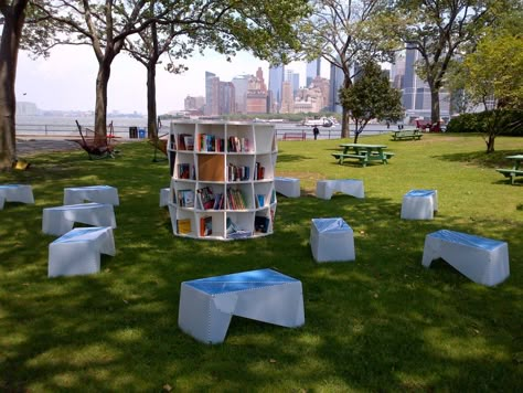 New York Public Library, Brooklyn Public LIbrary & Queens’ Library library lawn outdoor reading room on Governor’s Island ... round bookshelf and wooden benches for sitting and reading, pop up library open weekends, provides library services, summer 2013 Pop Up Library, Outdoor Library, Outdoor Reading Nooks, Outdoor Reading, Street Library, Governors Island, Outdoor Shelves, Mobile Library, Mini Library