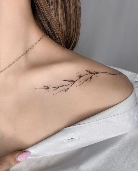 30 Gorgeous Shoulder Tattoos To Inspire Your Next Ink - 200😁 Inked Melodies: Sound Wave Tattoo Concepts  #tattooinspiration #inkedlife #bodyartlove #tattooaddict #tattooideas Minimalist Strength Tattoo, Shoulder Tattoos For Women Minimalist, Shoulder Wave Tattoo, Miniature Tattoos For Women, Tattoos Shoulder Women, Shoulder Tattoos For Women Elegant, Small Upper Arm Tattoos For Women, Over The Shoulder Tattoo For Women, Upper Shoulder Tattoos For Women