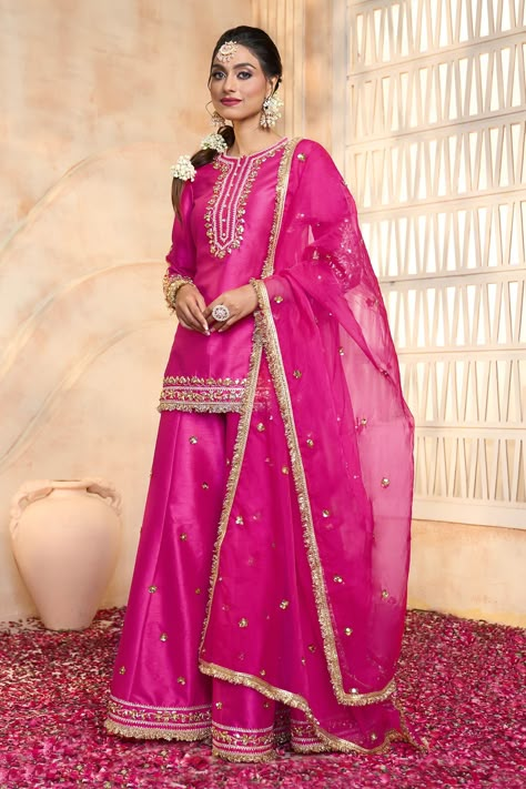 Shop for these amazing collections of Fuchsia Kurta And Sharara Dupion Embroidered Gota Round Floral Set For Women by Preeti S Kapoor online at Aza Fashions. Short Kurta With Skirt, Short Kurta Plazo Design, Short Kurta With Plazo, Plazo With Short Kurti, Suit With Lace Design, Elegant Royal Dresses, Colorful Style Outfits, Designer Suits For Wedding, Fancy Dress Material