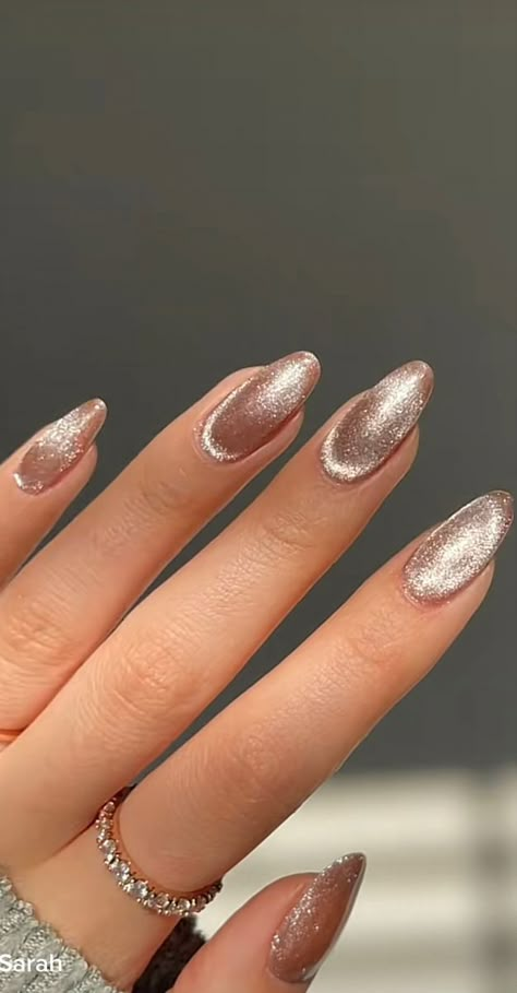 Explore the beauty of Timeless Elegance with our Artwork on Nails collection. From classic floral motifs to modern abstract designs, each nail art idea is a work of art that stands the test of time. Perfect for any occasion, these designs will add a touch of sophistication and creativity to your look. #NailArt #TimelessElegance #ClassicDesigns #ModernManicure. Champagne Cateye Nails, Light Brown Cat Eye Nails, Dip Nail Designs New Years, New Year’s Eve Nails￼, Velvet Nails Design, Winter Dip Nails, Maquillage Yeux Cut Crease, Nye Nails, Velvet Nails