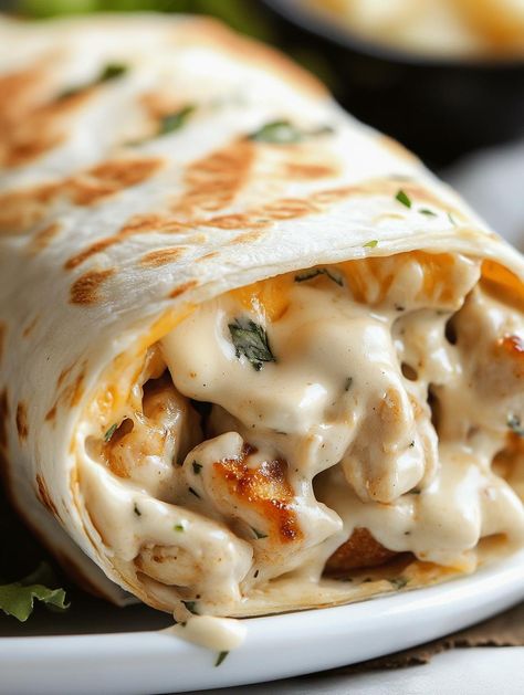 Cheesy Garlic Chicken Wraps Cheesy Garlic Chicken Wraps, Cheesy Garlic Chicken, Foods High In Fiber, Easy Bakes, Taco Spaghetti, Fast Dinner, Creamy Garlic Sauce, High In Fiber, Savory Chicken