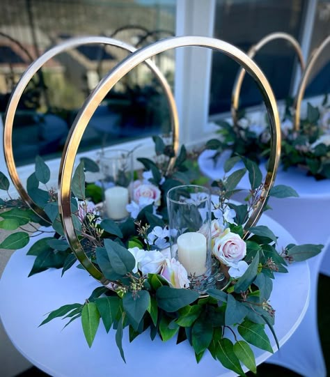 Gold Hoop Table Centerpiece, Gold Centerpieces With Greenery, Hoop Wedding Table Decor, Hunter Green And Gold Centerpieces, Forest Green And Gold Centerpieces, Emerald Green 15 Centerpieces, Ring Centerpieces Wedding, Sage And Gold Wedding Centerpieces, Engagement Party Green And Gold