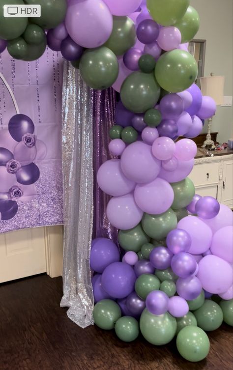 Beautiful purple, sage and lavender balloon backdrop for sweet sixteen birthday party Green And Purple Decorations Party, Lavender Theme Graduation Party, Green And Purple Party Decor, Sage Green And Lavender Birthday Party, Lavender And Sage Balloon Garland, Purple Green And Gold Birthday Party, Purple And Green Balloon Arch, Lilac And Green Birthday Party Ideas, Purple And Green Theme Party