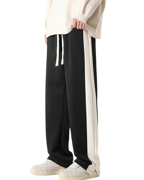 Price: (as of - Details) Discover the epitome of style and comfort with our Men's Baggy Trouser Track Pant, a versatile wardrobe essential. Crafted from premium, breathable fabric, these pants offer a relaxed fit with an elastic waistband and adjustable drawstring, ensuring a personalized and secure feel for every body shape. What sets these track pants apart are the two functional slant pockets, seamlessly blending convenience with style for those on the move.... https://rakeu.in/product/gr... Baggy Hoodies, Sports Track Pants, Sports Track, Baggy Style, Western Wear For Women, Ankle Shoes, Men Trousers, Track Workout, Track Pant