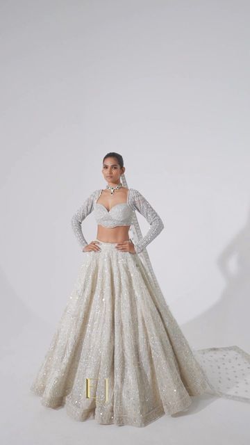 Ejaaz Couture on Instagram: "Luminous lehengas, theatrical trails, flawless feathers, scintillating swarovskis and cascading capes promising ‘All eyes on you’ Celebratory Couture 2023 now in Store. Jewelry by @ghanshyamdaskotawala — Shop with us: ⚜️at our Flagship Store : D 33, First Floor, Defence Colony, New Delhi - 110024 ⚜️Whatsapp : +91-9873789288 ⚜️Website : Link in the bio ⚜️Virtual Consultant : +91-9873789288 For inquiries & appointments, Call/whatsapp : +91-9873789288 __ #A Ejaaz Couture Lehenga, Couture Lehenga, Ejaaz Couture, Couture 2023, Engagement Dress, Ghagra Choli, Cocktail Reception, Store Jewelry, All Eyes