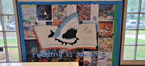 "Reading is Jawsome!" Shark Week display. Public library. Shark Poster Board Project, Dive Into A Good Book Display, Dinosaur Library Display, Ocean Library Display, Ocean Display, Under The Sea Library Bulletin Board, Dive Into A Good Book, Jawsome Shark, Ocean Unit